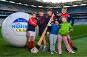 14 December 2023; In attendance at the Irish Life GAA Healthy Clubs Social Return of Investment evaluation report launch are young Clontarf GAA players, from left, Zach Fox, age 8, Rían Flynn, age 8, Nathan Murphy, age 11, Eliza Regan, age 6, front, Fiadh Murphy, age 6, front, and Max Fox, age 11, at Croke Park in Dublin. Photo by Seb Daly/Sportsfile