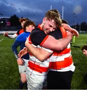 14 December 2023; Evan Bergin of St Mary's CBS, Portlaoise, celebrates with a supporter after the Anne McInerney Cup final match between St Mary's CBS, Portlaoise and East Glendalough School at Energia Park in Dublin. Photo by Ben McShane/Sportsfile