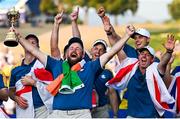 1 October 2023; Shane Lowry of Europe celebrates alongside teammate Rory McIlroy as he lifts the Ryder Cup after the final day of the 2023 Ryder Cup at Marco Simone Golf and Country Club in Rome, Italy. Photo by Brendan Moran/Sportsfile