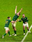 15 October 2023; Pieter-Steph Du Toit of South Africa, centre, celebrates with team-mates Handre Pollard, left, and Damian Willemse during the 2023 Rugby World Cup quarter-final match between France and South Africa at the Stade de France in Paris, France. Photo by Brendan Moran/Sportsfile