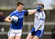 19 November 2023; John Heslin St Loman's Mullingar fends off Brian Byrne of Naas during the AIB Leinster GAA Football Senior Club Championship Semi-Final match between St Loman's Mullingar, Mullingar, and Naas, Kildare, at TEG Cusack Park in Mullingar, Westmeath. Photo by Piaras Ó Mídheach/Sportsfile