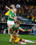 20 July 2023; Louise Quinn of Republic of Ireland heads the ball against Alanna Kennedy of Australia, while Ruesha Littlejohn of Republic of Ireland and Hayley Raso of Australia collide, during the FIFA Women's World Cup 2023 Group B match between Australia and Republic of Ireland at Stadium Australia in Sydney, Australia. Photo by Mick O'Shea/Sportsfile