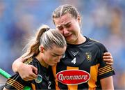 9 July 2023; Michelle Teehan of Kilkenny, left, consoles her fellow corner back Tiffanie Fitzgerald after their side's defeat in the All-Ireland Senior Camogie Championship quarter-final match between Cork and Kilkenny at Croke Park in Dublin. Photo by Piaras Ó Mídheach/Sportsfile