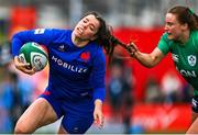 1 April 2023; Cyrielle Banet of France is tackled by Méabh Deely of Ireland, for which Deely was shown a yellow card, during the TikTok Women's Six Nations Rugby Championship match between Ireland and France at Musgrave Park in Cork. Photo by Brendan Moran/Sportsfile