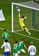 27 March 2023; France goalkeeper Mike Maignan saves the header from Nathan Collins of Republic of Ireland in the closing moments of the UEFA EURO 2024 Championship Qualifier match between Republic of Ireland and France at Aviva Stadium in Dublin. Photo by Piaras Ó Mídheach/Sportsfile