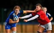 16 February 2023; Orla Wafer of Leinster evades the tackle of Saskia Wycherley of Munster during the U18 Girls Interprovincial match between Leinster and Munster at Terenure College in Dublin. Photo by Harry Murphy/Sportsfile