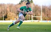 15 December 2023; Finn Treacy of Ireland on his way to scoring his side's first try during the U20 international friendly match between Ireland and Italy at UCD Bowl in Dublin. Photo by Seb Daly/Sportsfile