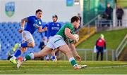 15 December 2023; Wilhelm De Klerk of Ireland dives over to score his side's third try during the U20 international friendly match between Ireland and Italy at UCD Bowl in Dublin. Photo by Seb Daly/Sportsfile