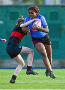 15 December 2023; Diana Izekor of Wilson's Hospital in action against Siobhan Layte of The High School during the Bank of Ireland Leinster Rugby Senior Girls League match between Wilson's Hospital and The High School at Energia Park in Dublin. Photo by Tyler Miller/Sportsfile