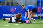 15 December 2023; Alex Connors of Newbridge College dives over to score her side's first try during the Bank of Ireland Leinster Rugby Senior Girls League match between Newbridge College and Wilson's Hospital at Energia Park in Dublin. Photo by Tyler Miller/Sportsfile