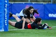 15 December 2023; Amelie Cree of The High School dives over to score her side's second try during the Bank of Ireland Leinster Rugby Senior Girls League match between The High School and Newbridge College at Energia Park in Dublin. Photo by Tyler Miller/Sportsfile