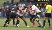 16 December 2023; Bundee Aki of Connacht is tackled by Maro Itoje and Jamie George of Saracens during the Investec Champions Cup Pool 1 Round 2 match between Saracens and Connacht at Stone X Stadium in Barnet, England. Photo by Brendan Moran/Sportsfile