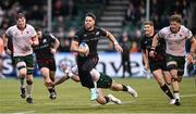 16 December 2023; Sean Maitland of Saracens beats the tackle of Shayne Bolton of Connacht during the Investec Champions Cup Pool 1 Round 2 match between Saracens and Connacht at Stone X Stadium in Barnet, England. Photo by Brendan Moran/Sportsfile