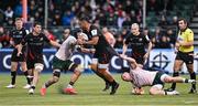 16 December 2023; Billy Vunipola of Saracens is tackled by Conor Oliver and Jordan Duggan of Connacht during the Investec Champions Cup Pool 1 Round 2 match between Saracens and Connacht at Stone X Stadium in Barnet, England. Photo by Brendan Moran/Sportsfile