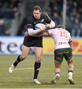 16 December 2023; Alex Goode of Saracens is tackled by John Porch of Connacht during the Investec Champions Cup Pool 1 Round 2 match between Saracens and Connacht at Stone X Stadium in Barnet, England. Photo by Brendan Moran/Sportsfile
