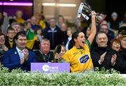 16 December 2023; Glanmire captain Ellen Twomey lifts the cup after her side's victory in the Currentaccount.ie LGFA All-Ireland Intermediate Club Championship final match between Ballinamore-Seán O'Heslin's of Leitrim and Glanmire of Cork at Croke Park in Dublin. Photo by Tyler Miller/Sportsfile