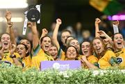 16 December 2023; Glanmire captain Ellen Twomey lifts the cup after her side's victory in the Currentaccount.ie LGFA All-Ireland Intermediate Club Championship final match between Ballinamore-Seán O'Heslin's of Leitrim and Glanmire of Cork at Croke Park in Dublin. Photo by Piaras Ó Mídheach/Sportsfile