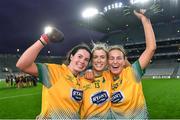 16 December 2023; Glanmire players, from left, Michelle Dullea, Evie Twomey and Megan Sheehan celebrate after their side's victory in the Currentaccount.ie LGFA All-Ireland Intermediate Club Championship final match between Ballinamore-Seán O'Heslin's of Leitrim and Glanmire of Cork at Croke Park in Dublin. Photo by Piaras Ó Mídheach/Sportsfile