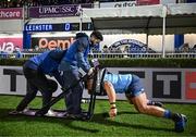 16 December 2023; Michael Ala'alatoa of Leinster warms up before with Leinster videographers Bernardo Santos and Tom O'Sullivan before the Investec Champions Cup Pool 4 Round 2 match between Leinster and Sale Sharks at the RDS Arena in Dublin. Photo by Harry Murphy/Sportsfile