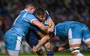 16 December 2023; Garry Ringrose of Leinster is tackled by James Harper and Ernst van Rhys of Sale Sharks during the Investec Champions Cup Pool 4 Round 2 match between Leinster and Sale Sharks at the RDS Arena in Dublin. Photo by Harry Murphy/Sportsfile