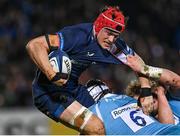 16 December 2023; Josh van der Flier of Leinster is tackled by Ernst van Rhys and Ross Harrison of Sale Sharks during the Investec Champions Cup Pool 4 Round 2 match between Leinster and Sale Sharks at the RDS Arena in Dublin. Photo by Harry Murphy/Sportsfile