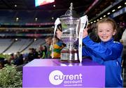 16 December 2023; Koa Peters from Ballymacarbry brings the Dolores Tyrrell Memorial Cup to the plinth before the Currentaccount.ie LGFA All-Ireland Senior Club Championship final match between Ballymacarby of Waterford and Kilkerrin-Clonberne of Galway at Croke Park in Dublin. Photo by Piaras Ó Mídheach/Sportsfile