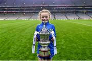 16 December 2023; Koa Peters from Ballymacarbry brings the Dolores Tyrrell Memorial Cup to the pitch before the Currentaccount.ie LGFA All-Ireland Senior Club Championship final match between Ballymacarby of Waterford and Kilkerrin-Clonberne of Galway at Croke Park in Dublin. Photo by Piaras Ó Mídheach/Sportsfile