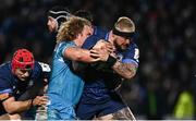 16 December 2023; Andrew Porter of Leinster is tackled by Ross Harrison of Sale Sharks during the Investec Champions Cup Pool 4 Round 2 match between Leinster and Sale Sharks at the RDS Arena in Dublin. Photo by Harry Murphy/Sportsfile