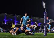 16 December 2023; Jamison Gibson-Park of Leinster dives over to score his side's second try despite the tackle of Raffi Quirke of Sale Sharks during the Investec Champions Cup Pool 4 Round 2 match between Leinster and Sale Sharks at the RDS Arena in Dublin. Photo by Harry Murphy/Sportsfile