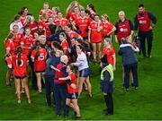 16 December 2023; Kilkerrin-Clonberne players and management celebrate after their side's victory in the Currentaccount.ie LGFA All-Ireland Senior Club Championship final match between Ballymacarby of Waterford and Kilkerrin-Clonberne of Galway at Croke Park in Dublin. Photo by Stephen Marken/Sportsfile