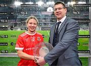 16 December 2023; Lynsey Noone of Kilkerrin-Clonberne receives the Player of the Match award from Frank Whitney, Chief Operations Officer, Payac, on behalf of competition sponsors currentaccount.ie, following the 2023 currentaccount.ie All-Ireland Ladies Senior Club Championship Final between Ballymacarbry of Waterford and Kilkerrin-Clonberne of Galway at Croke Park, Dublin. Photo by Tyler Miller/Sportsfile