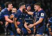 16 December 2023; Robbie Henshaw of Leinster, centre, celebrates with teammates Joe McCarthy and Garry Ringrose after scoring his side's third try during the Investec Champions Cup Pool 4 Round 2 match between Leinster and Sale Sharks at the RDS Arena in Dublin. Photo by Harry Murphy/Sportsfile