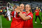 16 December 2023; Sarah Gormally of Kilkerrin-Clonberne, left, and team-mate Olivia Divilly of Kilkerrin-Clonberne celebrate with the trophy after the Currentaccount.ie LGFA All-Ireland Senior Club Championship final match between Ballymacarby of Waterford and Kilkerrin-Clonberne of Galway at Croke Park in Dublin. Photo by Tyler Miller/Sportsfile