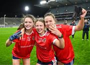 16 December 2023; Kilkerrin-Clonberne players, from left, Eva Noone, Lynsey Noone, and Hannah Noone celebrate after their side's victory in the Currentaccount.ie LGFA All-Ireland Senior Club Championship final match between Ballymacarby of Waterford and Kilkerrin-Clonberne of Galway at Croke Park in Dublin. Photo by Tyler Miller/Sportsfile