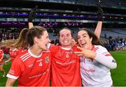 16 December 2023; Kilkerrin-Clonberne players from left, Claire Dunleavy, Nicola Ward, and Lisa Murphy celebrate after the Currentaccount.ie LGFA All-Ireland Senior Club Championship final match between Ballymacarby of Waterford and Kilkerrin-Clonberne of Galway at Croke Park in Dublin. Photo by Piaras Ó Mídheach/Sportsfile