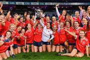 16 December 2023; Kilkerrin-Clonberne goalkeeper Lisa Murphy holds the Dolores Tyrrell Memorial Cup aloft after her side's victory in the Currentaccount.ie LGFA All-Ireland Senior Club Championship final match between Ballymacarby of Waterford and Kilkerrin-Clonberne of Galway at Croke Park in Dublin. Photo by Piaras Ó Mídheach/Sportsfile