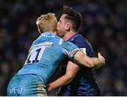 16 December 2023; Hugo Keenan of Leinster is tackled by Arron Reed of Sale Sharks during the Investec Champions Cup Pool 4 Round 2 match between Leinster and Sale Sharks at the RDS Arena in Dublin. Photo by Sam Barnes/Sportsfile