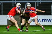 16 December 2023; Kevin Mahony of Ballygunner in action against Eanna Burke, left, and Shane Cooney of St Thomas' during the AIB GAA Hurling All-Ireland Senior Club Championship semi-final match between St Thomas' of Galway and Ballygunner of Waterford at Laois Hire O'Moore Park in Portlaoise, Laois. Photo by Ben McShane/Sportsfile