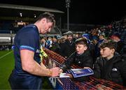 16 December 2023; Ryan Baird of Leinster signs autographs after his side's victory in the Investec Champions Cup Pool 4 Round 2 match between Leinster and Sale Sharks at the RDS Arena in Dublin. Photo by Harry Murphy/Sportsfile