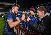 16 December 2023; Hugo Keenan of Leinster signs autographs after his side's victory in the Investec Champions Cup Pool 4 Round 2 match between Leinster and Sale Sharks at the RDS Arena in Dublin. Photo by Harry Murphy/Sportsfile