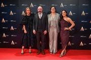 16 December 2023; In attendance during the RTÉ Sports Awards 2023 at RTÉ studios in Donnybrook, Dublin, are Cork Camogie players, from left, Laura Treacy, Hannah Looney, and  Amy O'Connor, with manager Matthew Twomey. Photo by Seb Daly/Sportsfile