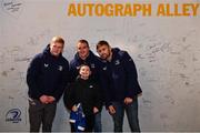 16 December 2023; Leinster players Jamie Osborne, Scott Penny, and Ross Byrne with supporters in autograph alley before the Investec Champions Cup Pool 4 Round 2 match between Leinster and Sale Sharks at the RDS Arena in Dublin. Photo by Sam Barnes/Sportsfile