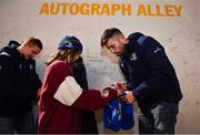 16 December 2023; Leinster players Ross Byrne, right, and Scott Penny with supporters in autograph alley before the Investec Champions Cup Pool 4 Round 2 match between Leinster and Sale Sharks at the RDS Arena in Dublin. Photo by Sam Barnes/Sportsfile