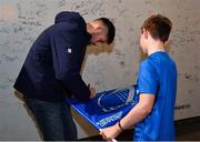 16 December 2023; Ross Byrne of Leinster signs an autograph in autograph alley before the Investec Champions Cup Pool 4 Round 2 match between Leinster and Sale Sharks at the RDS Arena in Dublin. Photo by Sam Barnes/Sportsfile