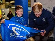16 December 2023; Jamie Osborne of Leinster signs an autograph for a supporter in autograph alley before the Investec Champions Cup Pool 4 Round 2 match between Leinster and Sale Sharks at the RDS Arena in Dublin. Photo by Sam Barnes/Sportsfile