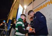 16 December 2023; Ross Byrne of Leinster signs an autograph for a supporter in autograph alley before the Investec Champions Cup Pool 4 Round 2 match between Leinster and Sale Sharks at the RDS Arena in Dublin. Photo by Sam Barnes/Sportsfile