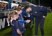 16 December 2023; Match mascots Ella Ní Bhuachalla and Charlie Flood with Harry Byrne of Leinster before the Investec Champions Cup Pool 4 Round 2 match between Leinster and Sale Sharks at the RDS Arena in Dublin. Photo by Harry Murphy/Sportsfile