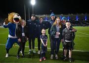 16 December 2023; Match mascot Ella Ní Bhuachalla with family mother Laura, father Marcus Ó Buachalla, sister Laoise and brother Conor, and Leo the Lion and Leinster players Harry Byrne, Luke McGrath and Rhys Ruddock before the Investec Champions Cup Pool 4 Round 2 match between Leinster and Sale Sharks at the RDS Arena in Dublin. Photo by Harry Murphy/Sportsfile
