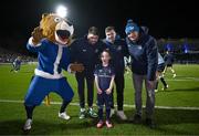 16 December 2023; Match mascot Ella Ní Bhuachalla with Leo the Lion and Leinster players Harry Byrne, Luke McGrath and Rhys Ruddock before the Investec Champions Cup Pool 4 Round 2 match between Leinster and Sale Sharks at the RDS Arena in Dublin. Photo by Harry Murphy/Sportsfile