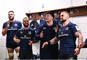 16 December 2023; Thomas Clarkson of Leinster, second right, sings in the dressing room alongside teammates Jason Jenkins, Jamison Gibson-Park and Andrew Porter after their side's victory in Investec Champions Cup Pool 4 Round 2 match between Leinster and Sale Sharks at the RDS Arena in Dublin. Photo by Harry Murphy/Sportsfile